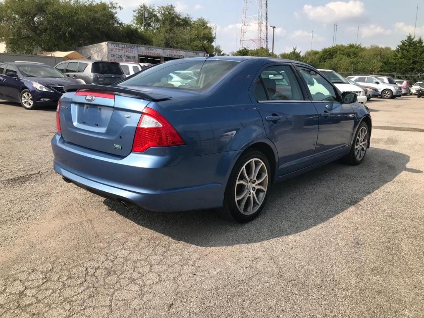 2010 BLUE FORD FUSION SE (3FAHP0HG2AR) with an 3.0L engine, Automatic transmission, located at 1507 S Hwy 67, Cedar Hill, TX, 75104, (972) 293-1833, 32.556370, -96.973297 - Photo#2