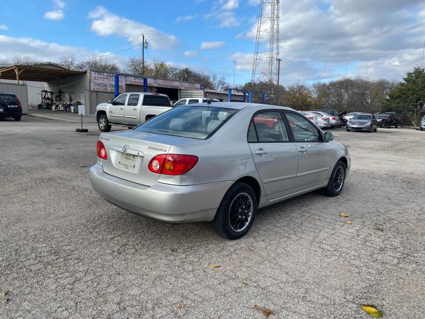 2004 SILVER TOYOTA COROLLA CE (1NXBR32EX4Z) with an 1.8L engine, Automatic transmission, located at 1507 S Hwy 67, Cedar Hill, TX, 75104, (972) 293-1833, 32.556370, -96.973297 - Photo#2