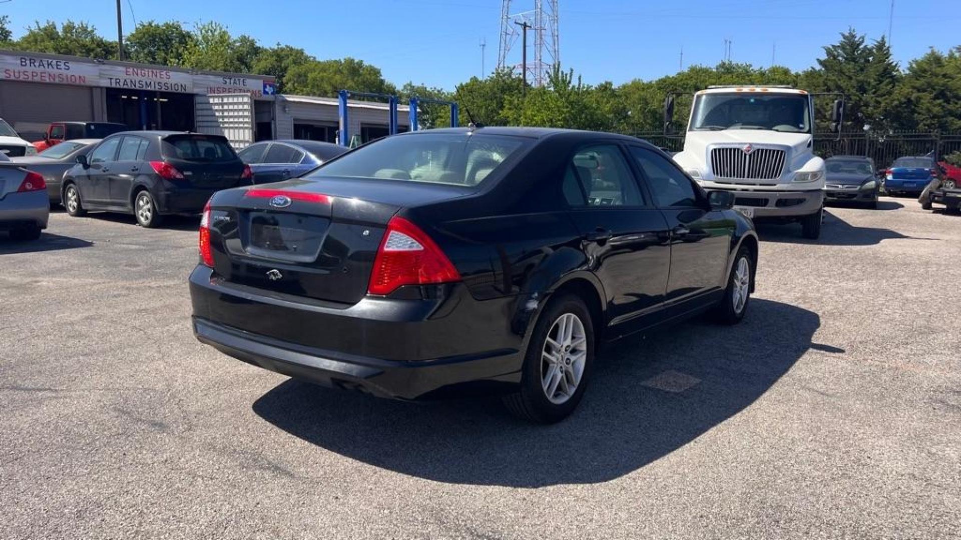 2010 BLACK FORD FUSION S (3FAHP0GAXAR) with an 2.5L engine, Automatic transmission, located at 1507 S Hwy 67, Cedar Hill, TX, 75104, (972) 293-1833, 32.556370, -96.973297 - Photo#3