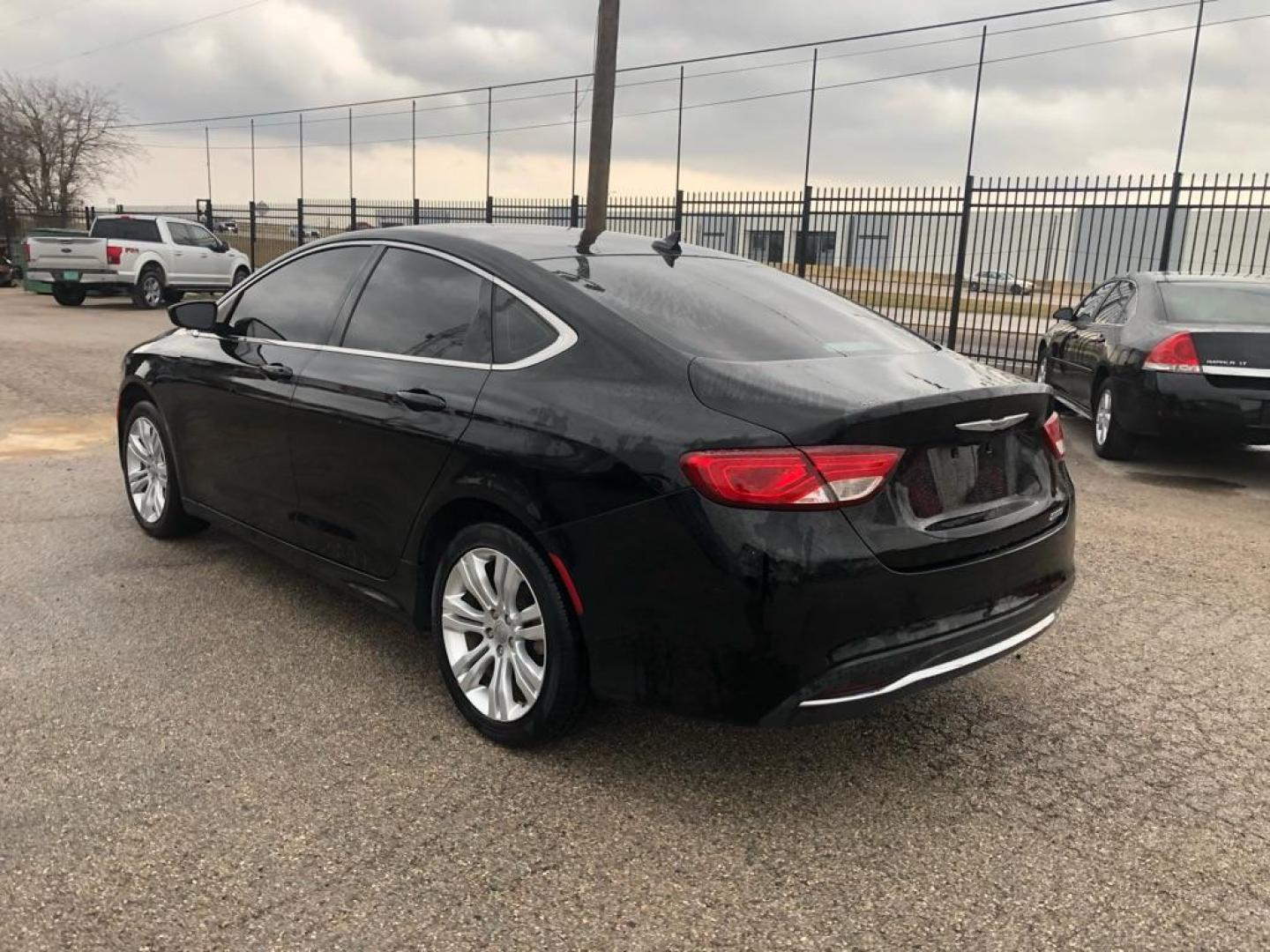 2015 BLACK CHRYSLER 200 LIMITED (1C3CCCAB0FN) with an 2.4L engine, Automatic transmission, located at 1507 S Hwy 67, Cedar Hill, TX, 75104, (972) 293-1833, 32.556370, -96.973297 - Photo#2