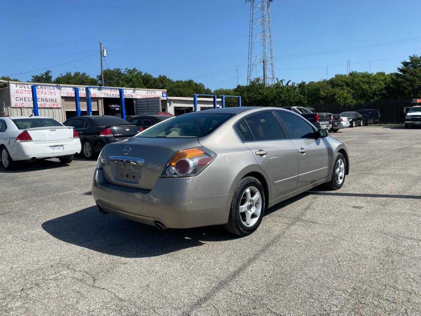 2012 GOLD NISSAN ALTIMA BASE (1N4AL2AP6CC) with an 2.5L engine, Continuously Variable transmission, located at 1507 S Hwy 67, Cedar Hill, TX, 75104, (972) 293-1833, 32.556370, -96.973297 - Photo#2