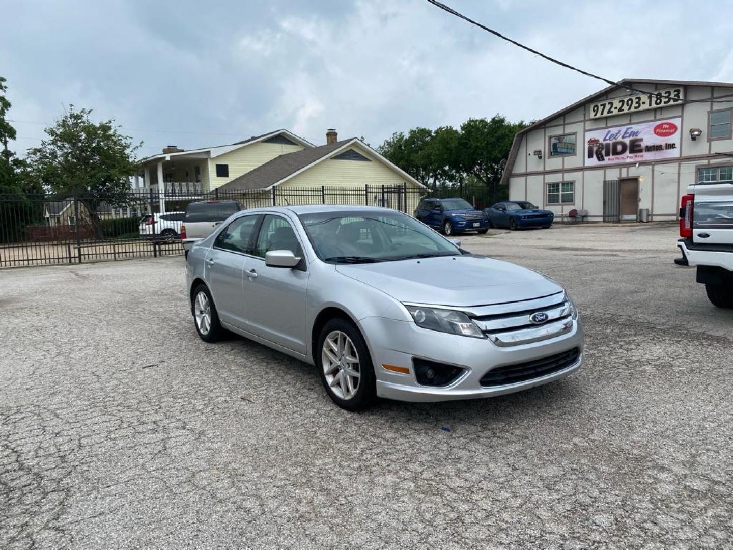 2012 SILVER FORD FUSION SEL (3FAHP0JA3CR) with an 2.5L engine, Automatic transmission, located at 1507 S Hwy 67, Cedar Hill, TX, 75104, (972) 293-1833, 32.556370, -96.973297 - Photo#1