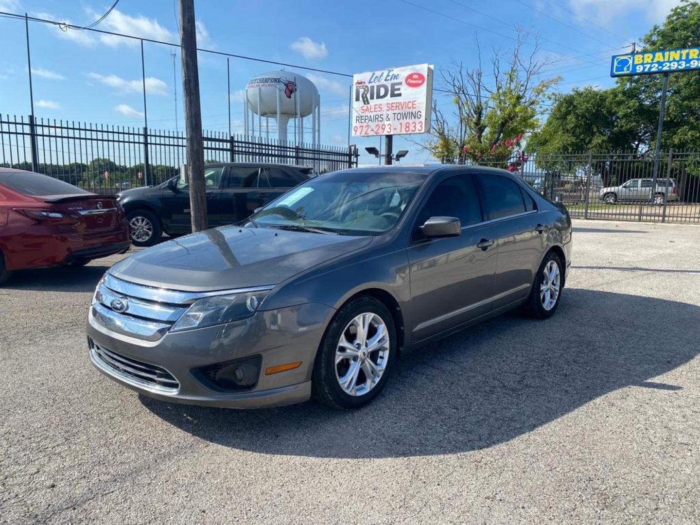 2012 GRAY FORD FUSION SE (3FAHP0HA9CR) with an 2.5L engine, Automatic transmission, located at 1507 S Hwy 67, Cedar Hill, TX, 75104, (972) 293-1833, 32.556370, -96.973297 - Photo#0