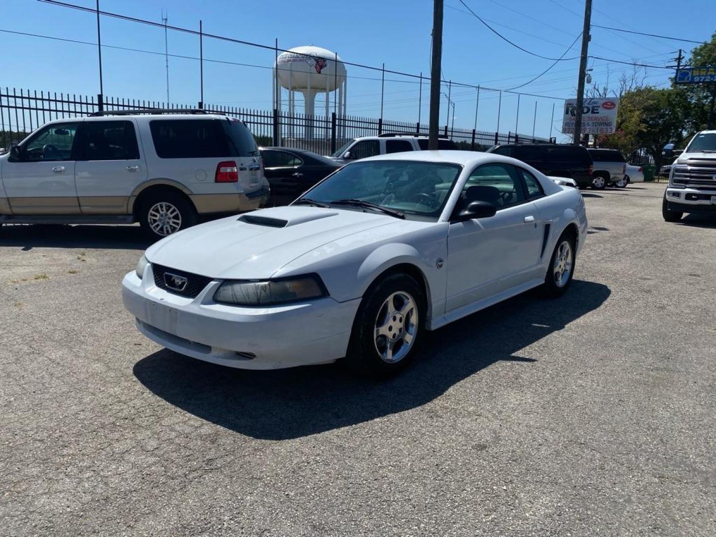 2004 WHITE FORD MUSTANG (1FAFP40664F) with an 3.9L engine, Automatic transmission, located at 1507 S Hwy 67, Cedar Hill, TX, 75104, (972) 293-1833, 32.556370, -96.973297 - Photo#0