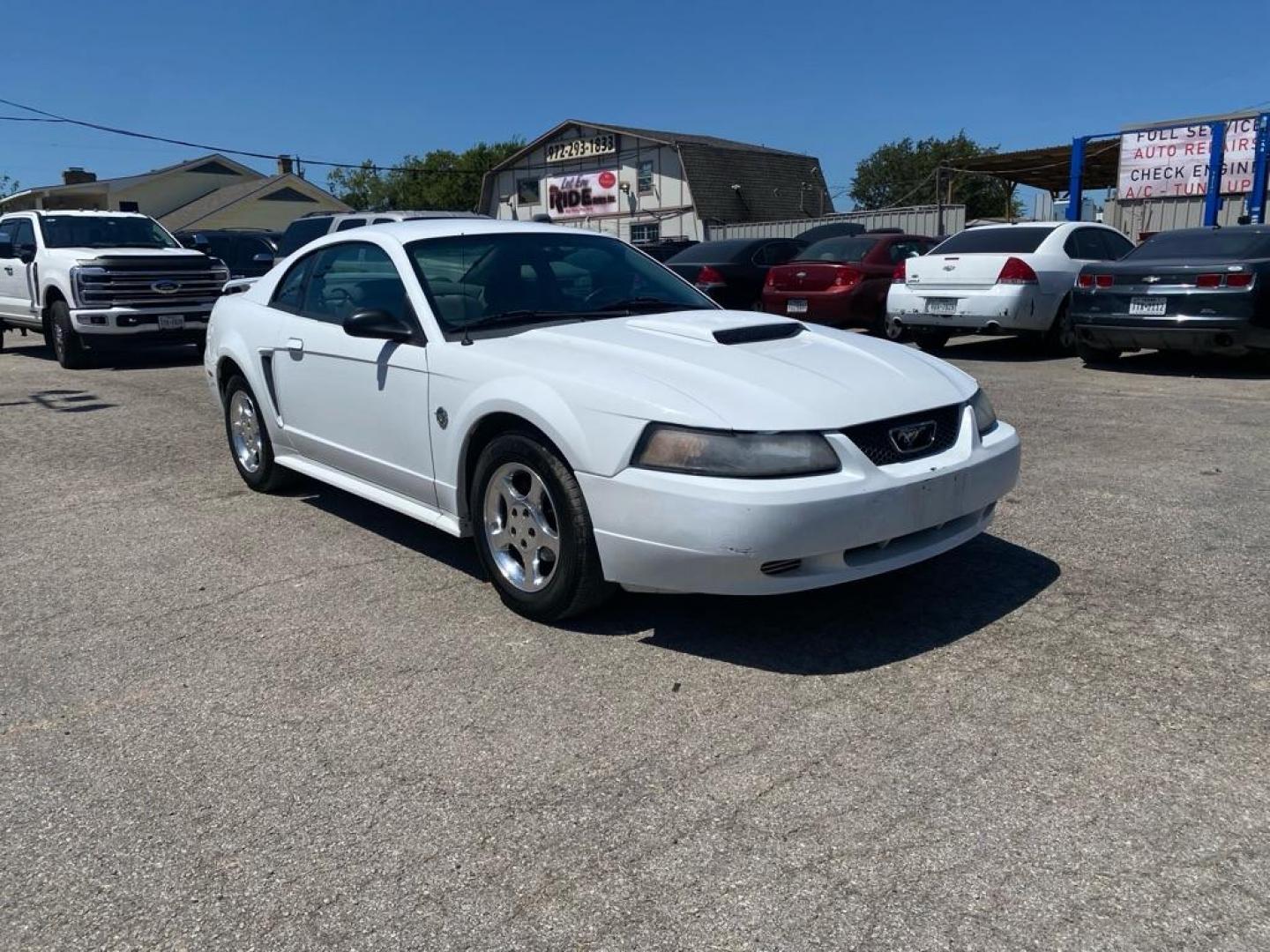 2004 WHITE FORD MUSTANG (1FAFP40664F) with an 3.9L engine, Automatic transmission, located at 1507 S Hwy 67, Cedar Hill, TX, 75104, (972) 293-1833, 32.556370, -96.973297 - Photo#1