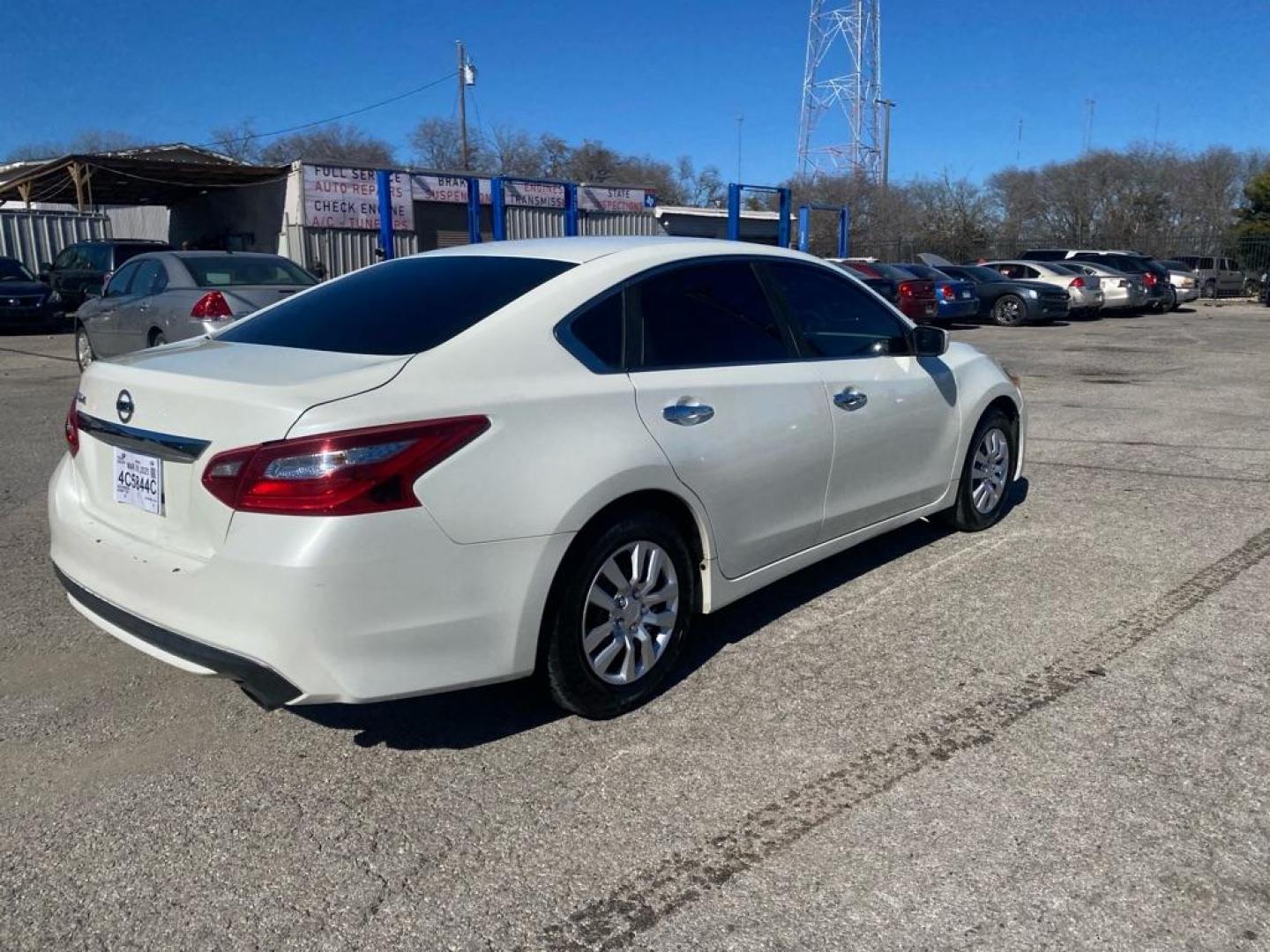 2016 WHITE NISSAN ALTIMA 2.5 (1N4AL3AP6GC) with an 2.5L engine, Continuously Variable transmission, located at 1507 S Hwy 67, Cedar Hill, TX, 75104, (972) 293-1833, 32.556370, -96.973297 - Photo#2