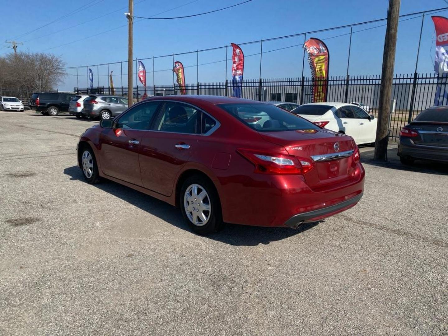 2016 RED NISSAN ALTIMA 2.5 (1N4AL3AP3GC) with an 2.5L engine, Continuously Variable transmission, located at 1507 S Hwy 67, Cedar Hill, TX, 75104, (972) 293-1833, 32.556370, -96.973297 - Photo#3